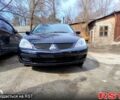 Черный Мицубиси Лансер, объемом двигателя 16 л и пробегом 217 тыс. км за 4100 $, фото 1 на Automoto.ua