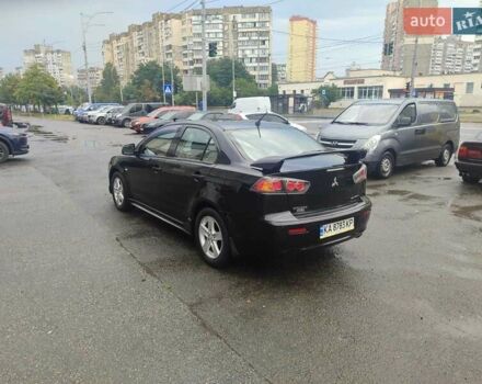 Черный Мицубиси Лансер, объемом двигателя 2 л и пробегом 229 тыс. км за 7300 $, фото 5 на Automoto.ua