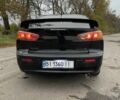 Чорний Міцубісі Lancer, об'ємом двигуна 2 л та пробігом 400 тис. км за 4396 $, фото 13 на Automoto.ua