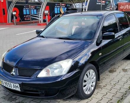 Міцубісі Lancer 2008 у Тернополі на Automoto.ua Чорний Міцубісі Lancer, об'ємом двигуна 1.58 л та пробігом 182 тис. км за 5600 $, фото 5 на Automoto.ua