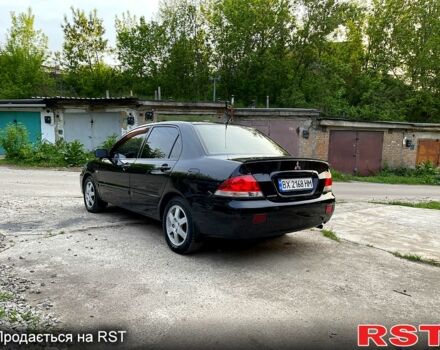 Чорний Міцубісі Lancer, об'ємом двигуна 1.6 л та пробігом 190 тис. км за 3950 $, фото 6 на Automoto.ua