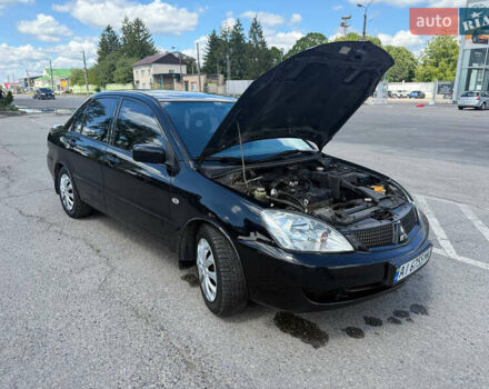 Чорний Міцубісі Lancer, об'ємом двигуна 1.6 л та пробігом 292 тис. км за 3600 $, фото 12 на Automoto.ua
