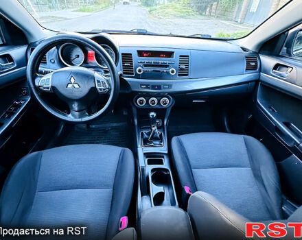 Чорний Міцубісі Lancer, об'ємом двигуна 2 л та пробігом 240 тис. км за 5900 $, фото 10 на Automoto.ua