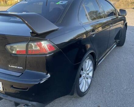 Чорний Міцубісі Lancer, об'ємом двигуна 2 л та пробігом 223 тис. км за 7800 $, фото 2 на Automoto.ua