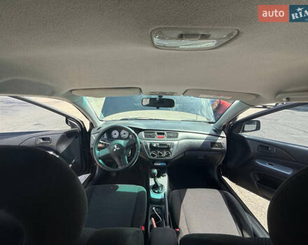 Чорний Міцубісі Lancer, об'ємом двигуна 1.6 л та пробігом 292 тис. км за 3600 $, фото 19 на Automoto.ua