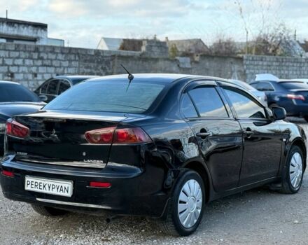 Чорний Міцубісі Lancer, об'ємом двигуна 1.5 л та пробігом 220 тис. км за 4600 $, фото 4 на Automoto.ua