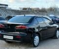 Чорний Міцубісі Lancer, об'ємом двигуна 1.5 л та пробігом 220 тис. км за 4600 $, фото 4 на Automoto.ua