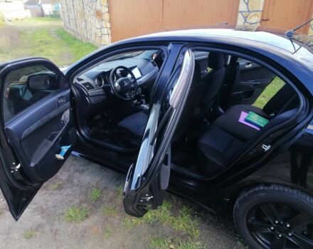 Міцубісі Lancer 2008 у Києві на Automoto.ua Чорний Міцубісі Lancer, об'ємом двигуна 2 л та пробігом 196 тис. км за 5500 $, фото 14 на Automoto.ua