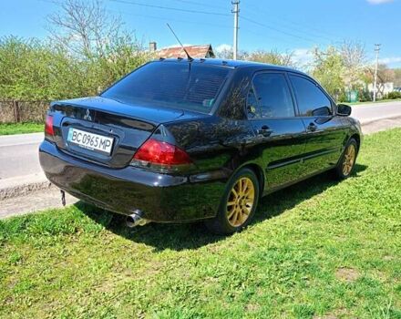 Мицубиси Лансер 2008 в Львове на Automoto.ua Черный Мицубиси Лансер, объемом двигателя 1.58 л и пробегом 200 тыс. км за 5200 $, фото 69 на Automoto.ua