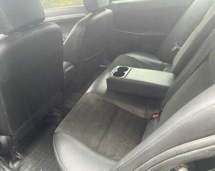 Черный Мицубиси Лансер, объемом двигателя 2 л и пробегом 190 тыс. км за 3100 $, фото 7 на Automoto.ua