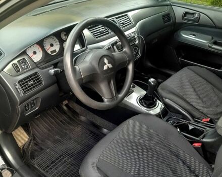 Черный Мицубиси Лансер, объемом двигателя 1.6 л и пробегом 206 тыс. км за 4200 $, фото 3 на Automoto.ua