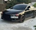 Черный Мицубиси Лансер, объемом двигателя 2 л и пробегом 230 тыс. км за 7777 $, фото 2 на Automoto.ua