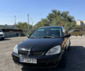 Чорний Міцубісі Lancer, об'ємом двигуна 1.6 л та пробігом 275 тис. км за 3850 $, фото 1 на Automoto.ua