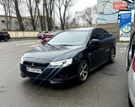Черный Мицубиси Лансер, объемом двигателя 2 л и пробегом 217 тыс. км за 7000 $, фото 30 на Automoto.ua
