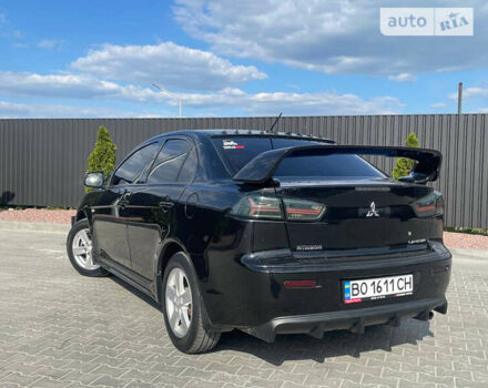 Чорний Міцубісі Lancer, об'ємом двигуна 2 л та пробігом 178 тис. км за 7500 $, фото 4 на Automoto.ua