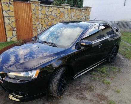 Міцубісі Lancer 2008 у Києві на Automoto.ua Чорний Міцубісі Lancer, об'ємом двигуна 2 л та пробігом 196 тис. км за 5500 $, фото 7 на Automoto.ua