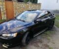 Міцубісі Lancer 2008 у Києві на Automoto.ua Чорний Міцубісі Lancer, об'ємом двигуна 2 л та пробігом 196 тис. км за 5500 $, фото 7 на Automoto.ua