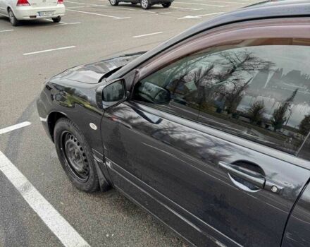 Чорний Міцубісі Lancer, об'ємом двигуна 1.6 л та пробігом 245 тис. км за 4500 $, фото 13 на Automoto.ua