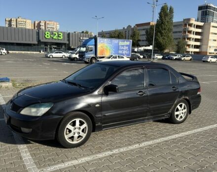 Чорний Міцубісі Lancer, об'ємом двигуна 1.6 л та пробігом 364 тис. км за 3000 $, фото 5 на Automoto.ua