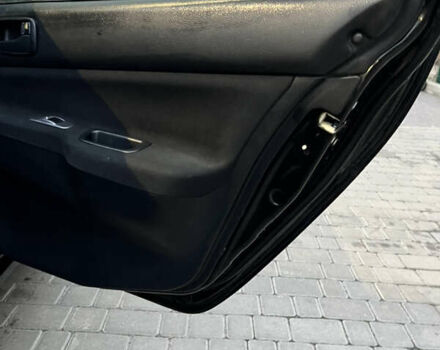 Чорний Міцубісі Lancer, об'ємом двигуна 1.6 л та пробігом 277 тис. км за 3900 $, фото 6 на Automoto.ua