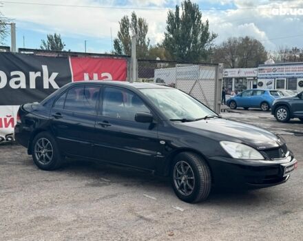 Мицубиси Лансер 2008 в Запорожье на Automoto.ua Черный Мицубиси Лансер, объемом двигателя 1.6 л и пробегом 316 тыс. км за 4290 $, фото 7 на Automoto.ua