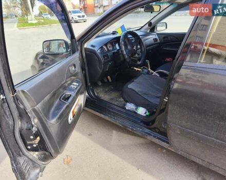 Черный Мицубиси Лансер, объемом двигателя 1.6 л и пробегом 358 тыс. км за 4300 $, фото 5 на Automoto.ua