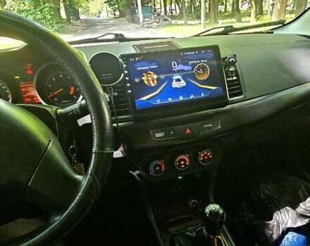 Черный Мицубиси Лансер, объемом двигателя 1.5 л и пробегом 205 тыс. км за 6300 $, фото 2 на Automoto.ua