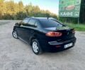 Чорний Міцубісі Lancer, об'ємом двигуна 2 л та пробігом 195 тис. км за 7000 $, фото 3 на Automoto.ua