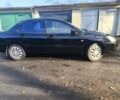 Черный Мицубиси Лансер, объемом двигателя 1.6 л и пробегом 243 тыс. км за 3200 $, фото 6 на Automoto.ua