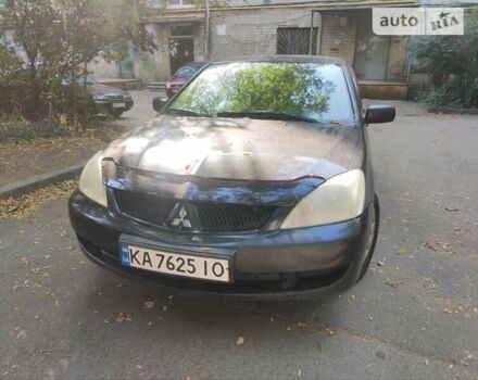Чорний Міцубісі Lancer, об'ємом двигуна 1.6 л та пробігом 335 тис. км за 3100 $, фото 1 на Automoto.ua