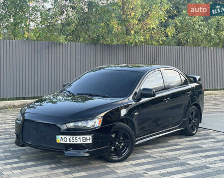 Чорний Міцубісі Lancer, об'ємом двигуна 2 л та пробігом 300 тис. км за 4600 $, фото 1 на Automoto.ua