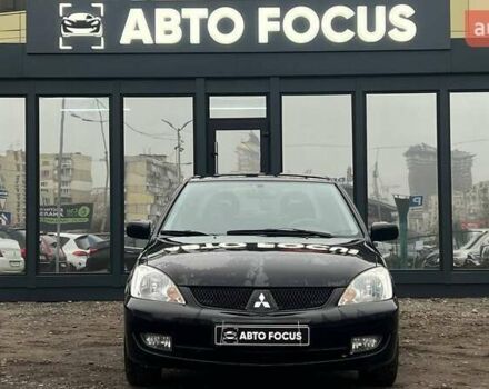 Чорний Міцубісі Lancer, об'ємом двигуна 1.6 л та пробігом 340 тис. км за 6190 $, фото 2 на Automoto.ua