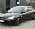 Чорний Міцубісі Lancer, об'ємом двигуна 1.58 л та пробігом 350 тис. км за 4250 $, фото 1 на Automoto.ua