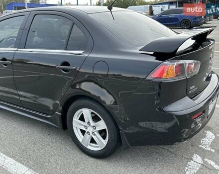 Чорний Міцубісі Lancer, об'ємом двигуна 2 л та пробігом 199 тис. км за 7900 $, фото 7 на Automoto.ua
