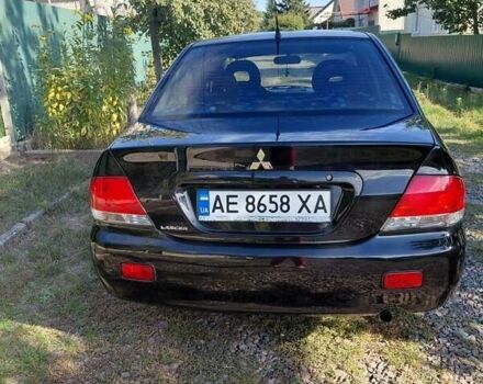 Чорний Міцубісі Lancer, об'ємом двигуна 1.6 л та пробігом 221 тис. км за 5200 $, фото 5 на Automoto.ua