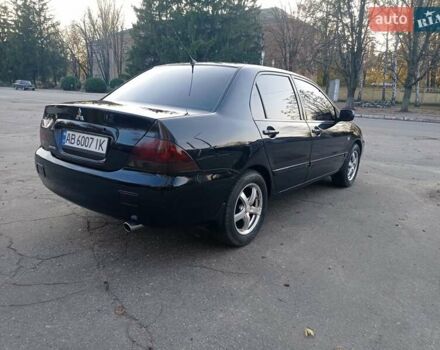 Чорний Міцубісі Lancer, об'ємом двигуна 1.58 л та пробігом 286 тис. км за 4950 $, фото 8 на Automoto.ua