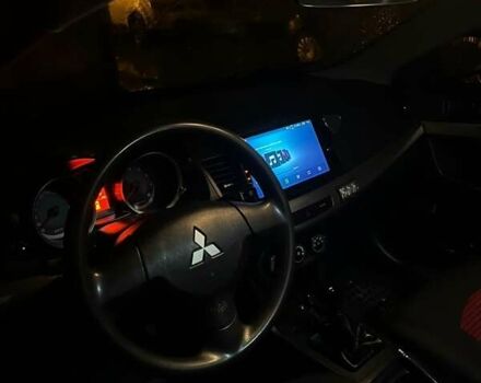 Черный Мицубиси Лансер, объемом двигателя 1.5 л и пробегом 167 тыс. км за 5500 $, фото 7 на Automoto.ua