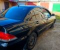 Чорний Міцубісі Lancer, об'ємом двигуна 1.6 л та пробігом 230 тис. км за 4700 $, фото 1 на Automoto.ua