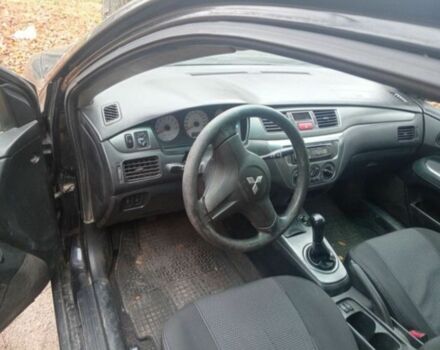 Черный Мицубиси Лансер, объемом двигателя 6 л и пробегом 190 тыс. км за 4500 $, фото 5 на Automoto.ua