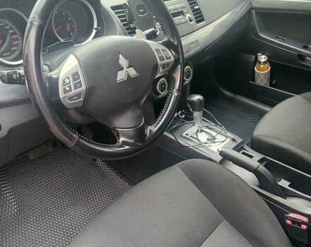 Черный Мицубиси Лансер, объемом двигателя 2 л и пробегом 229 тыс. км за 7300 $, фото 11 на Automoto.ua