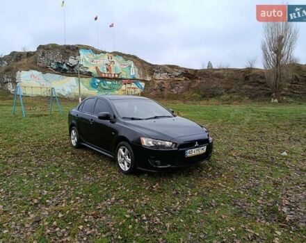 Черный Мицубиси Лансер, объемом двигателя 2 л и пробегом 200 тыс. км за 5100 $, фото 5 на Automoto.ua