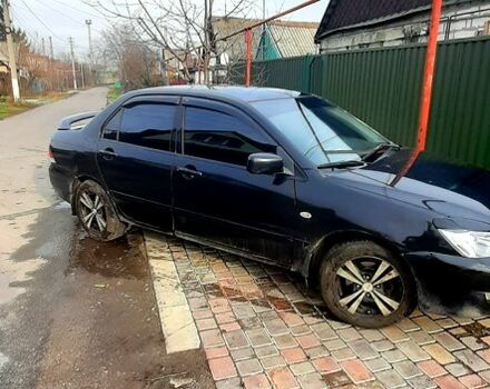 Чорний Міцубісі Lancer, об'ємом двигуна 1.6 л та пробігом 250 тис. км за 5500 $, фото 4 на Automoto.ua