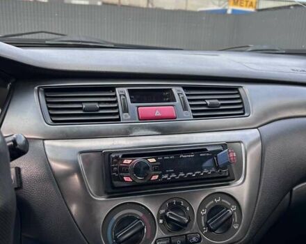 Чорний Міцубісі Lancer, об'ємом двигуна 1.6 л та пробігом 310 тис. км за 3500 $, фото 20 на Automoto.ua