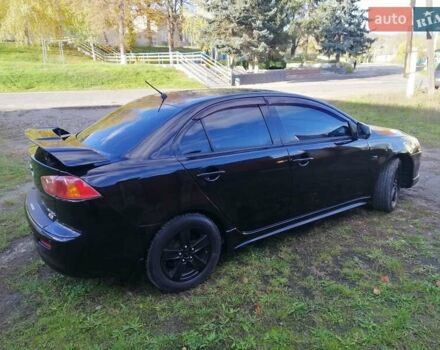 Мицубиси Лансер 2008 в Киеве на Automoto.ua Черный Мицубиси Лансер, объемом двигателя 2 л и пробегом 196 тыс. км за 5500 $, фото 3 на Automoto.ua