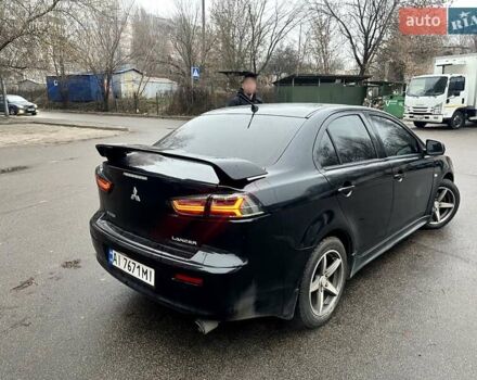 Черный Мицубиси Лансер, объемом двигателя 2 л и пробегом 217 тыс. км за 7000 $, фото 18 на Automoto.ua
