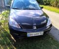 Чорний Міцубісі Lancer, об'ємом двигуна 1.6 л та пробігом 232 тис. км за 4400 $, фото 1 на Automoto.ua