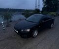 Черный Мицубиси Лансер, объемом двигателя 2 л и пробегом 201 тыс. км за 6600 $, фото 1 на Automoto.ua