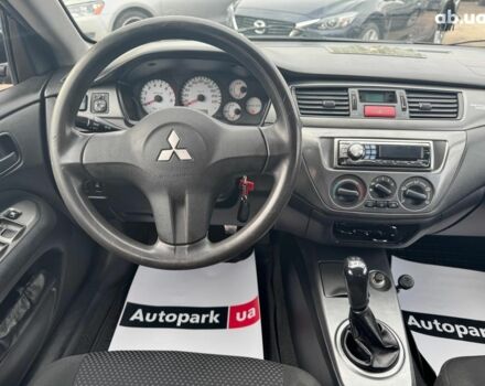 Мицубиси Лансер 2008 в Запорожье на Automoto.ua Черный Мицубиси Лансер, объемом двигателя 1.6 л и пробегом 316 тыс. км за 4290 $, фото 9 на Automoto.ua