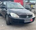 Мицубиси Лансер 2008 в Запорожье на Automoto.ua Черный Мицубиси Лансер, объемом двигателя 1.6 л и пробегом 316 тыс. км за 4290 $, фото 2 на Automoto.ua