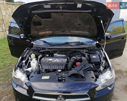 Мицубиси Лансер 2008 в Киеве на Automoto.ua Черный Мицубиси Лансер, объемом двигателя 2 л и пробегом 196 тыс. км за 5500 $, фото 31 на Automoto.ua